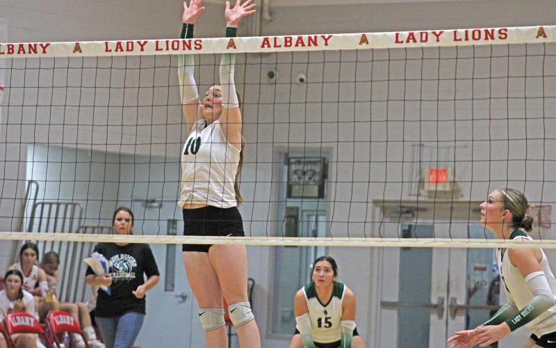 (Photo/Alex Kielar) Preslie Malcuit gets in a defensive stance at the net to defend hits during the Lady Bucks’ opening match of the Albany Tournament pool play against Aspermont. The Lady Bucks went 1-1 and advanced to the gold bracket play, taking place Saturday, Aug. 30. 