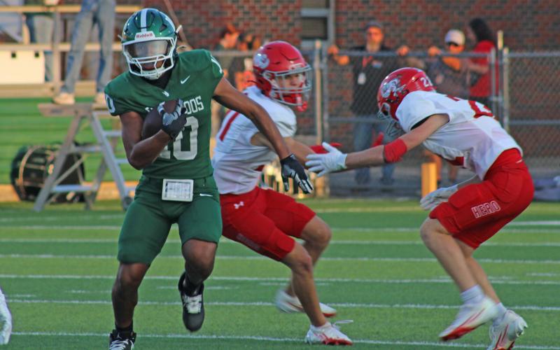 (Photo/Alex Kielar) Jaime Cruz returns a kickoff Friday, Aug. 29, during the Buckaroos’ opening game against the Holliday Eagles at Buckaroo Stadium.