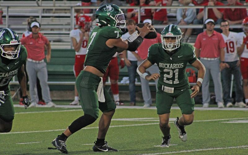 (Photo/Alex Kielar) Crispen Pineda records an open field tackle of a Holliday ball carrier during the Bucks’ opening game 43-0 loss to the Eagles at Buckaroo Stadium, Friday, Aug. 29. 
