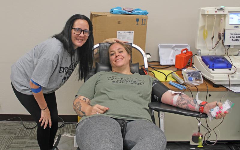 (Photo/Alex Kielar) First responders donated blood during the Battle of the Badges blood drive earlier this year and Sacred Cross EMS was announced as the winner in their first year participating. 