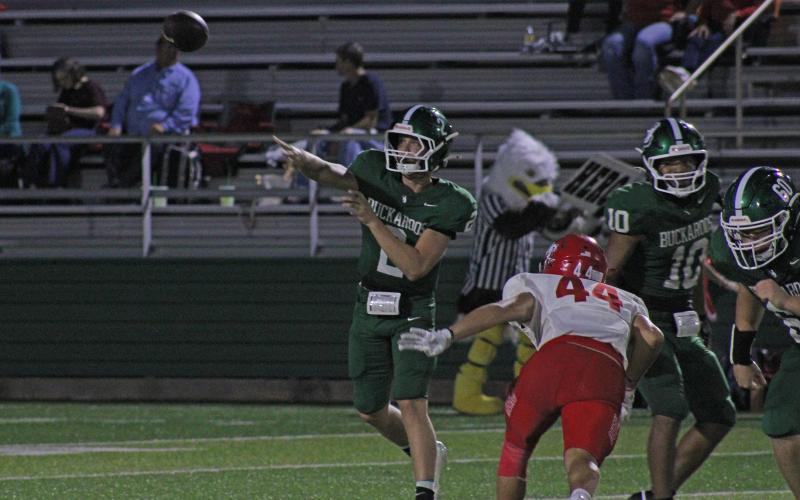 (Photo/Alex Kielar) Hudson Woodward attempts a creen pass to the right side of the field during the Bucks’ opening game against Holliday at Buckaroo Stadium Friday, Aug. 29. The Bucks continued to roll with a three-quarterback system with all three getting looks during the game. 
