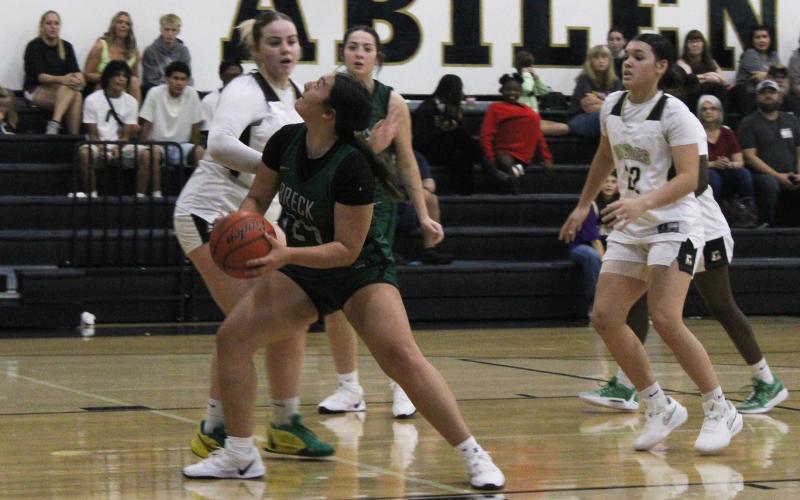 (Photo/Alex Kielar) Kyra Canada looks to shoot in the paint against a Lady Eagles' defender, as the Lady Bucks defeated Abilene High, 39-36, Saturday, Nov. 8.