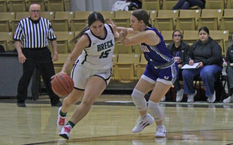 (Photo/Alex Kielar) Analia Palacios drives past a Gorman defender towards the basket in the Lady Bucks’ first game of the Holiday Ford Classic Thursday, Nov. 13 at Gordon High School. 