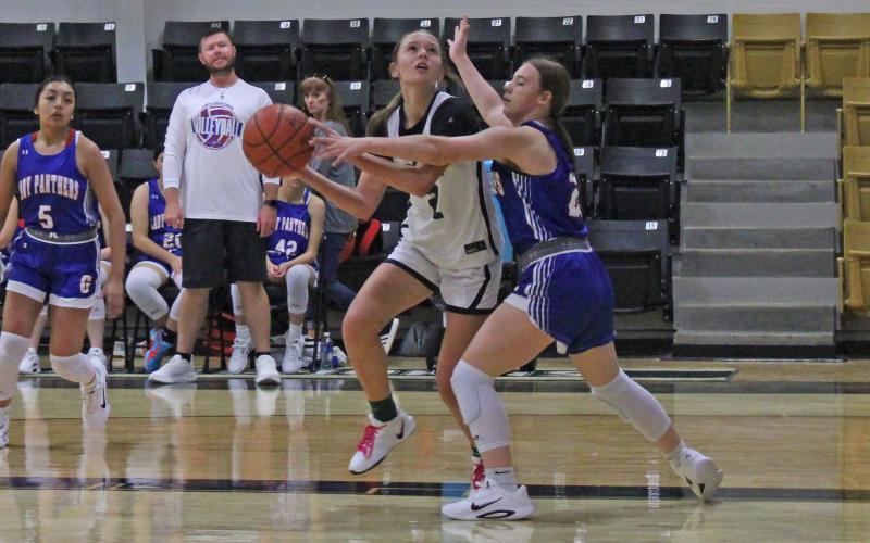 (Photo/Alex Kielar) LaKyla Bartley looks to shoot in the paint against a Gorman defender in the Lady Bucks’ first game of the Holiday Ford Classic Thursday, Nov. 13 at Gordon High School. 