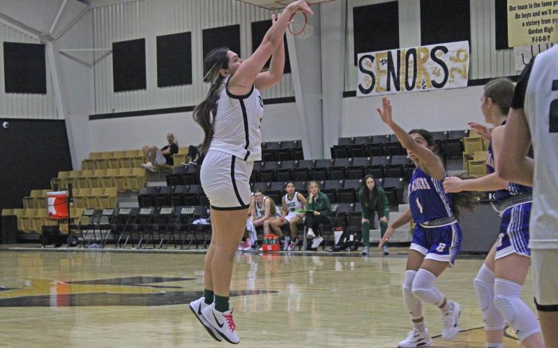 (Photo/Alex Kielar) Analia Palacios shoots a three-pointer that she knocked down during the Lady Bucks’  first game of the Holiday Ford Classic Thursday, Nov. 13 at Gordon High School. 