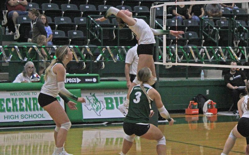 (Photo/Alex Kielar) Kamden Tidwell gets ready to serve in the Lady Bucks’ home district opener Tuesday, Sept. 9 against the Comanche Maidens that they dropped in three straight sets. 