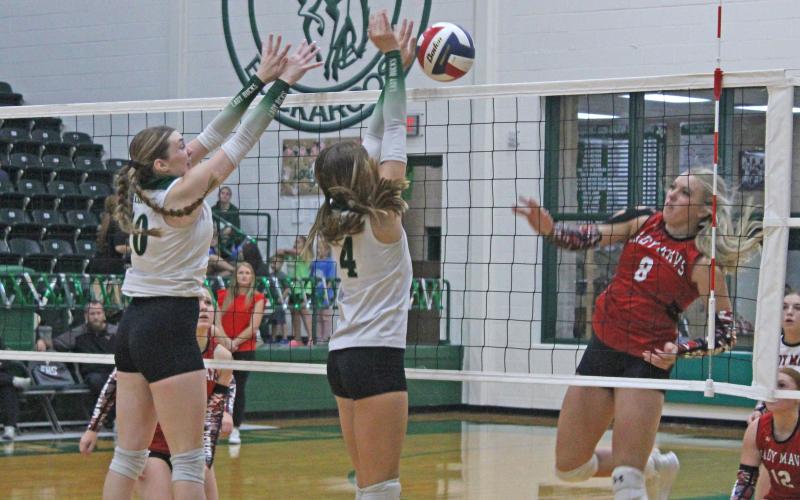 (Photo/Alex Kielar) Preslie Malcuit and freshman LaKyla Bartley work defensively to block an attempted kill by an Eastland player at the front line Tuesday, Sept. 16. Both players were key factors in the Lady Bucks coming back from a two-set deficit in the home match. 