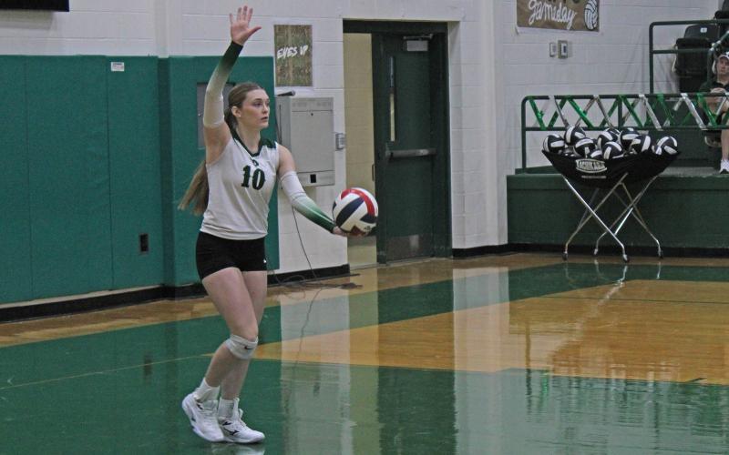 (Photo/Alex Kielar) Preslie Malcuit sets up to serve in the Lady Bucks’ three-set win over Millsap at home Friday, Sept. 26. 