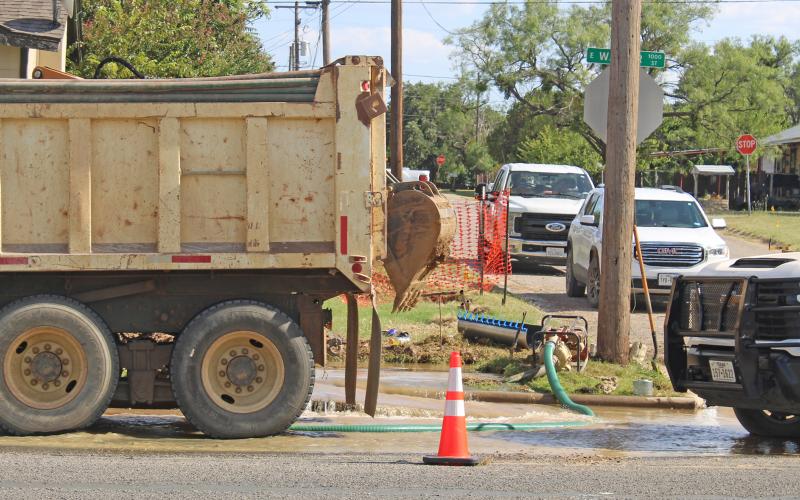 (Photo/Alex Kielar) Water was pouring onto East Walker Street from a busted water line Thursday afternoon, July 31 at the intersection of South Easton Street. 
