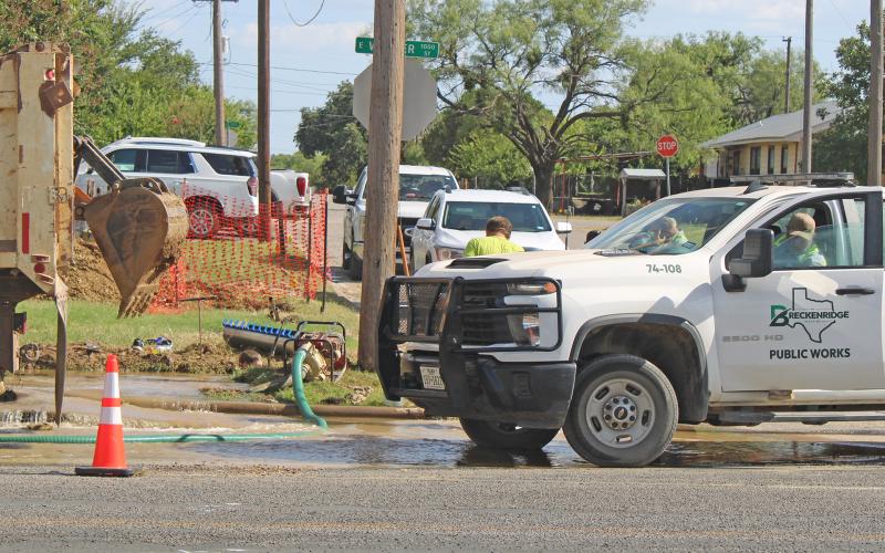 (Photo/Alex Kielar) A contractor working on East Walker Street hit a water line Thursday afternoon, July 31 which resulted in both water towers being drained. After a water boil notice was initially only put out for residents on the east side of Breckenridge, it was soon after elevated to a city-wide notice. City employees worked for several hours to repair the line. 