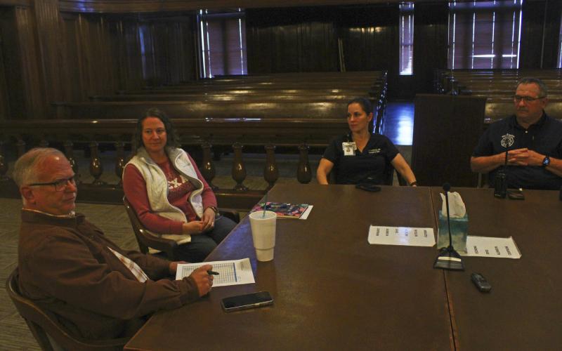 (Photo/Alex Kielar) Stephens County Chief Appraiser Will Thompson, left, touched on the funding that remains following the two separate occasions in which SNAP-eligible individuals and families received gift cards at the county's emergency coalition meeting Monday, Nov. 10.
