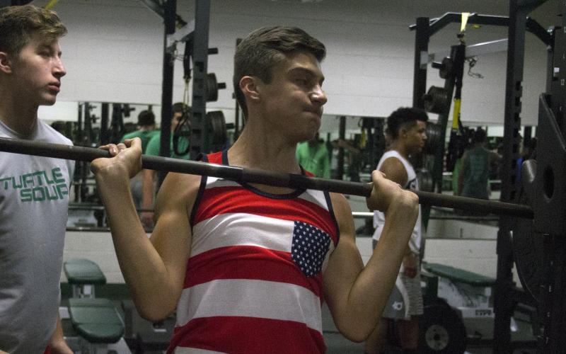 Breckenridge High School freshman Jonas Arellano racks a weight bar after a set of lunges Monday during the Buckaroo football team’s offseason strength and conditioning program. Arellano hopes to make an immediate impact this season.