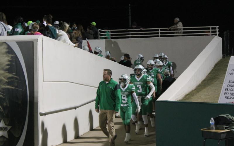 Coach Casey Hubble leads the Bucks to the tunnel minutes before their playoff kicked off in Abilene. BA photo by James Norman