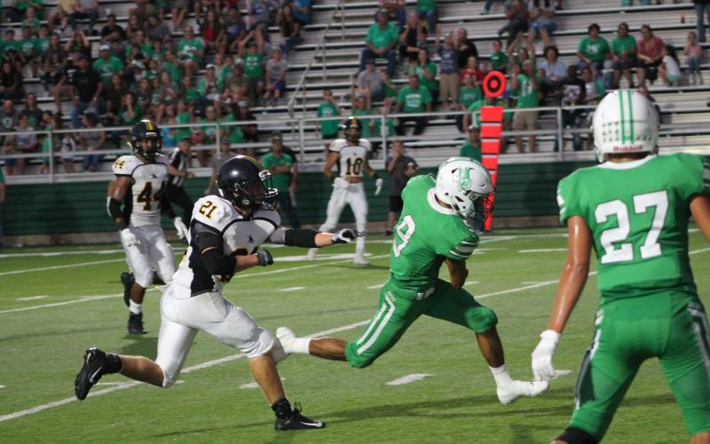 Angel Ruiz (9) breaks free for a run. BA photo by James Norman