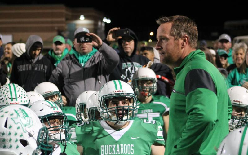 Coach Casey Hubble addresses the team after the loss. He said in his speech how proud he was of the team for their comeback and what they accomplished on the year. BA photo by James Norman