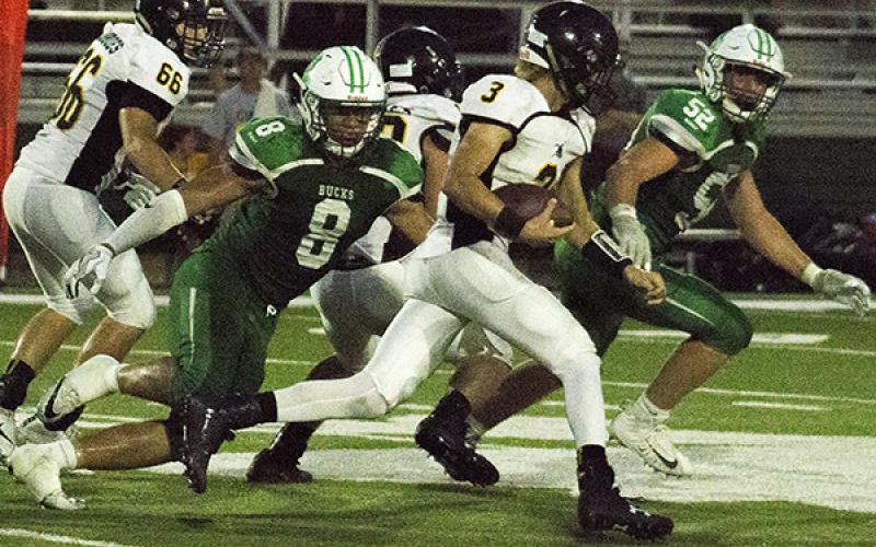 Senior defensive end Terrance Roberson tracks down a runner in the backfield.