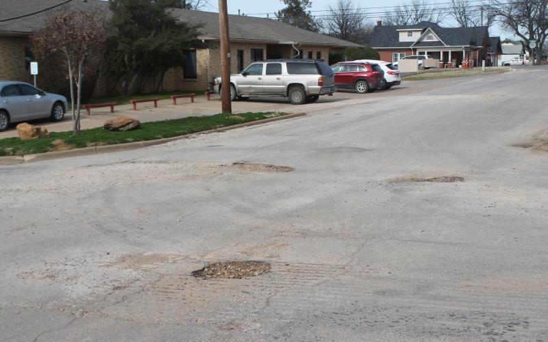 Pictured here are potholes around the Hospital off South Hartford Street. BA photo by James Norman
