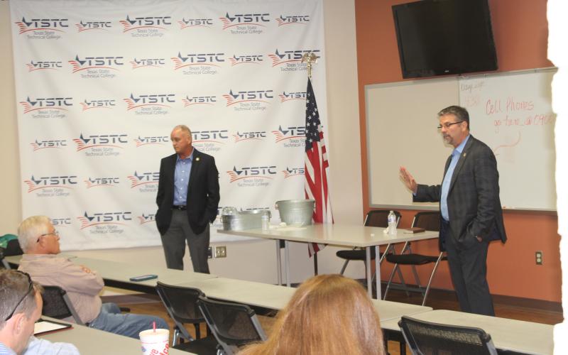 Texas Rep. Mike Lang (left) and Texas Sen. Charles Perry (right) talk with residents and officials about the issues in the state. The town hall featured discussion on several issues. BA photo by James Norman