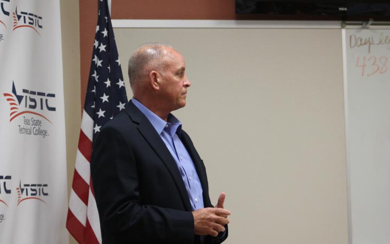 Texas Rep. Mike Lang waits for his turn to speak during the town hall. Perry and Lang rotated during the discussion, but Lang did not chime in on all questions. BA photo by James Norman