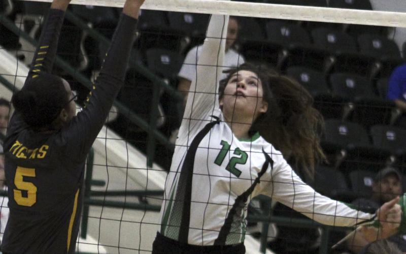 Breckenridge middle hitter Calista Lambert makes a kill.