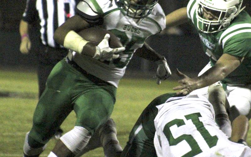 Breckenridge senior running back Zach Willis runs for a 22-yard touchdown, his second after returning an interception 35 yards for a TD in the second quarter.