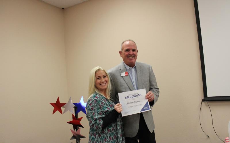 Rick Denbow, who is Provost for all West Texas campuses of TSTC, was on hand to present the O.H. Reaugh Scholarship to Michelle Renee Atkinson, who is enrolled in the LVN program at TSTC. BA photo by Jean Hayworth
