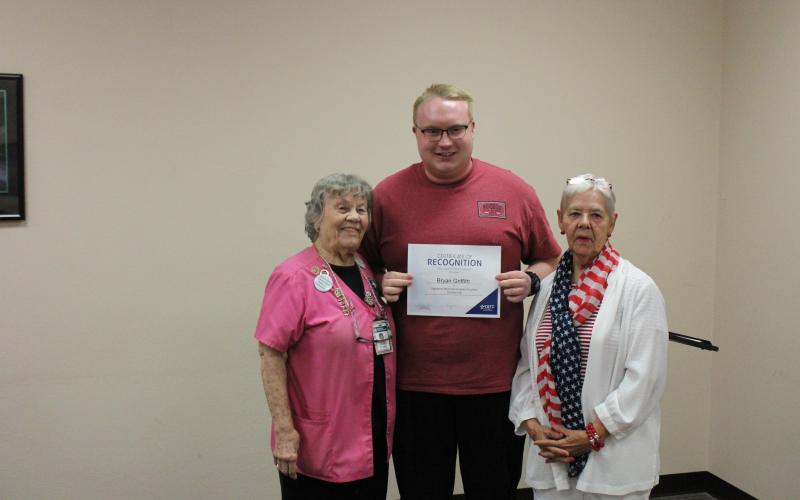 The final scholarship of the day was from the Stephens Memorial Hospital Auxiliary and Sandy Broyles and Winnine Barclay were on hand to present this scholarship to Bryan Griffith, who also is enrolled in the LVN program. BA photo by James Norman
