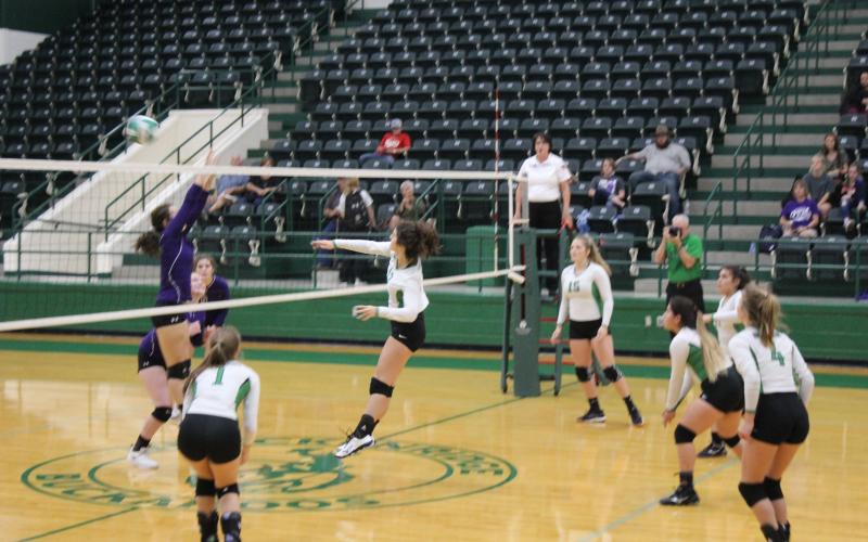 JV Green player, Liberty Blades (13), strikes a kill shot back to the Tolar JV players that was not returned. The Lady Bucks teams was playing Tolar at home Tuesday, Sept. 11, at the Breckenridge ISD Athletic and Fine Arts Center. BA photo by Jean Hayworth