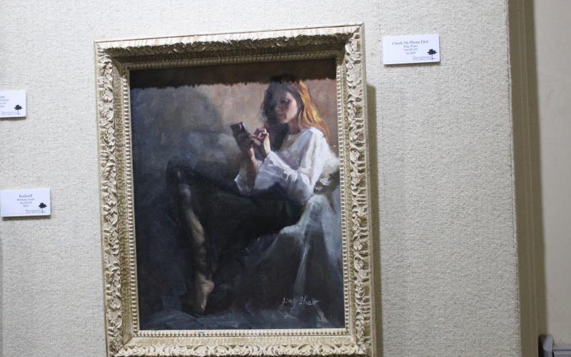 The Breckenridge Fine Arts Center is hosting the Portrait Society of America exhibit with the first place awarded to Jing ZHao for her oil painting titled, "Check My Phone First." BA photo by James Norman