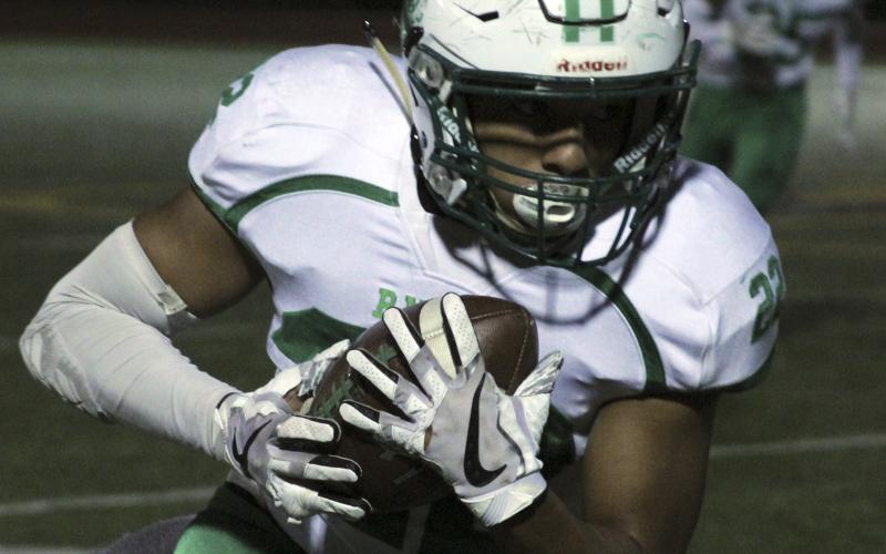Breckenridge senior receiver Riley Durham breaks away for a touchdown in the third quarter of Friday night's game against Boyd.