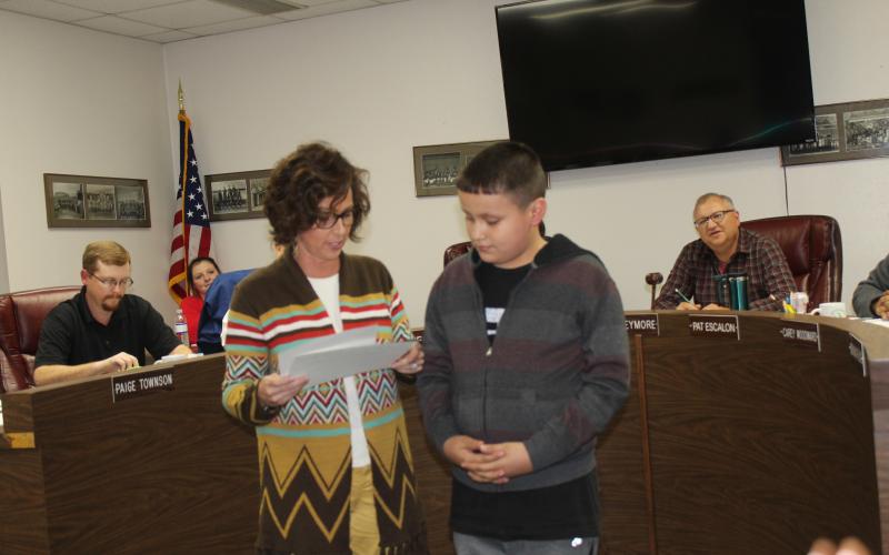 The Student of the Month for South Elementary is fifth-grader Anthony Munoz from Jennifer McKay's classroom. Assistant principal Prairie Freeman was on hand to present the certificate. BA photo by Jean Hayworth