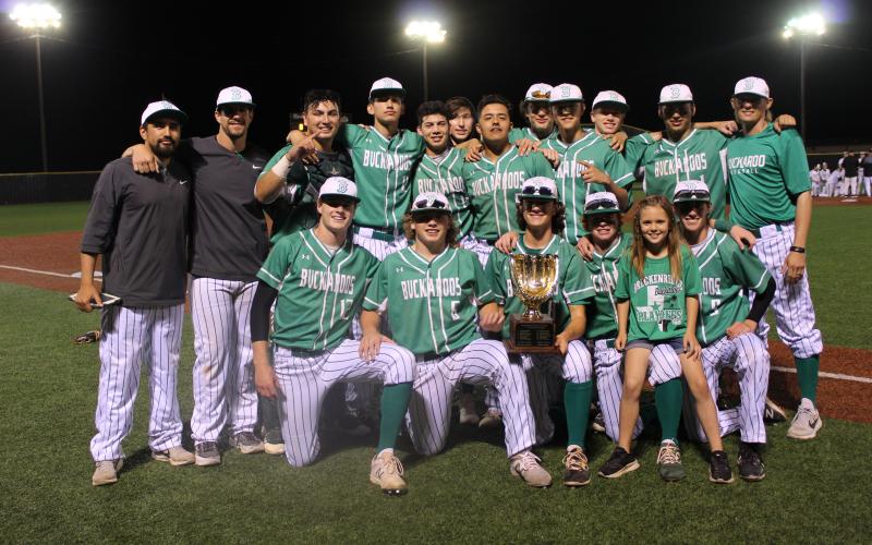 The Bucks baseball team poses with their new hardware after besting the Henrietta Bearcats 9-1 and 10-0. BA photo by James Norman