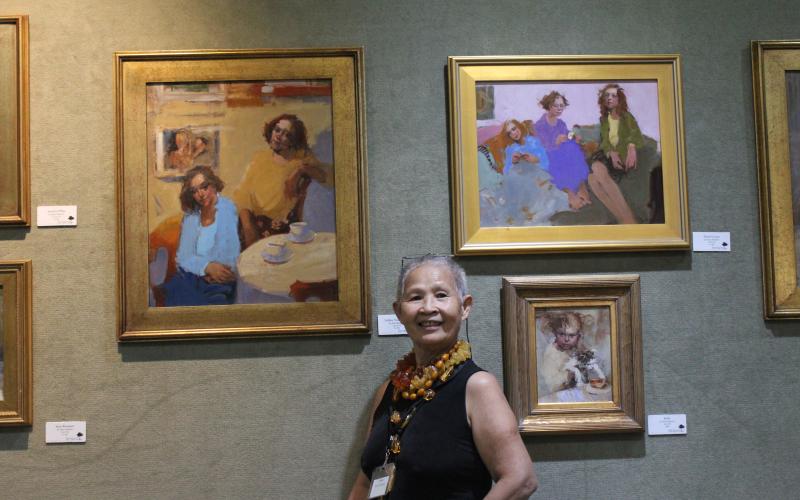 Kim Roberti has her first independent Portrait show in the East Gallery of the Breckenridge Fine Arts Center, with 55 portraits and seven still life oil paintings. Pictured among a few of her portraits is Roberti, at upper left is "Follow Your Heart," upper right is "Three Graces" and lower left is "Kitty." BA photo by Jean Hayworth