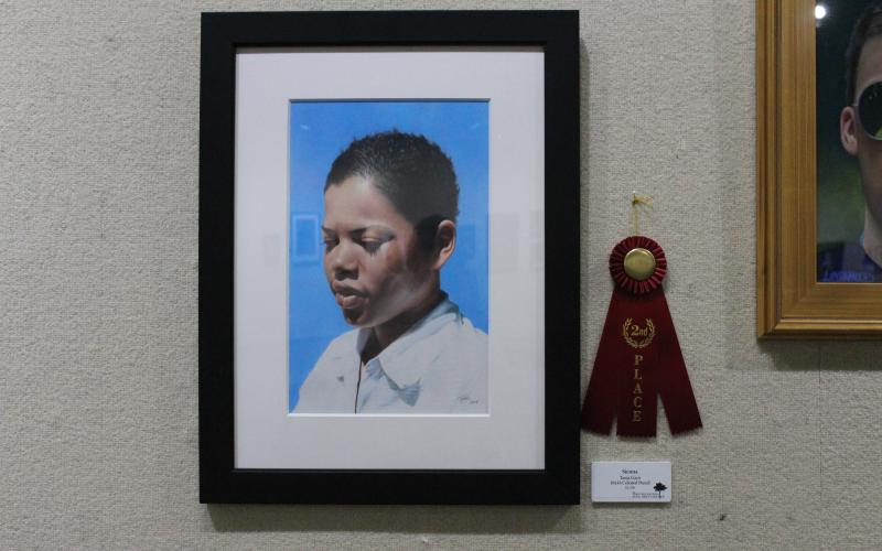 The award for second place went to Tonja Gant for her oil painting "Sienna," at the Breckenridge Fine Arts Center reception for the Portrait Society of America held Saturday, Sept. 17. BA photo by Jean Hayworth