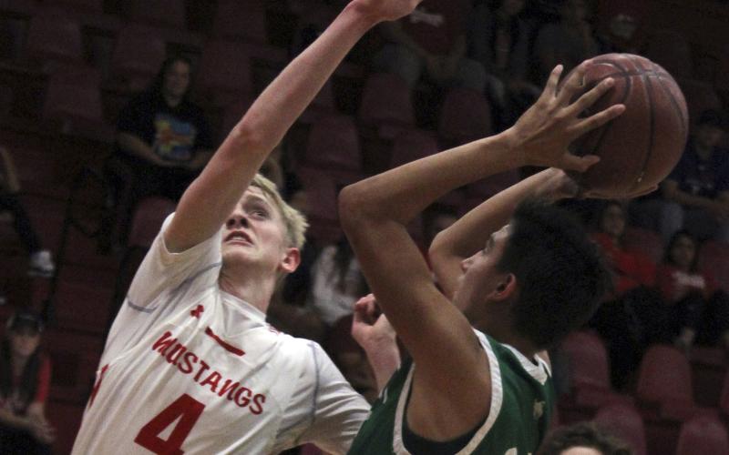 Aaryn Medina hits a fade-away jumper against Sweetwater Saturday.