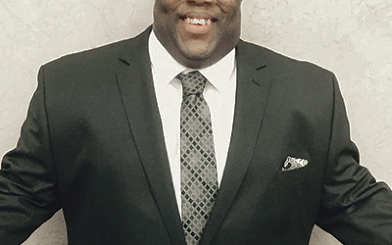 Shown here is new K-Lakes sports director "Dee" Wright.
