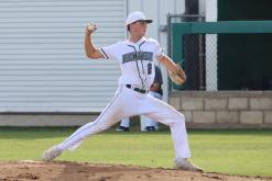 Hudson Woodward winds up a throw during a game earlier in the season for the Bucks. Woodward was honored with his team for their district performance. (Photo/Thomas Wallner)