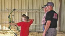 The Stephens County 4H Shooting Sports archery practices at the Stephens County Ag Barn. Stephens County 4H Shooting Sports