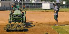 Led by Buckaroos baseball coach Jeremy West and the Breckenridge athletic department, the upgrades being done to the Lady Bucks softball field got off the ground last week. After ripping out the old grass and leveling out the dirt as part of the regrading process, the crew began to lay down hundreds of real grass sod patches on the field. Photo/Alex Kielar