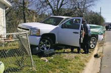 All available units were called at approximately 11:45 a.m. Monday Feb. 3 to the scene of a one-vehicle wreck on the 500 block of W. Elliot Street. The white truck pictured went off the road into the chain linked fence on the property. No serious injuries were reported. Photo/Alex Kielar