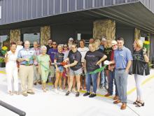 The Breckenridge Chamber of Commerce officially welcomed Boomtown Burger into the Breckenridge business community with a ribbon cutting ceremony Tuesday, Aug. 8 outside of the restaurant, located at 1318 E. Walker St. in Breckenridge. The restaurant is owned by Cheyenna Wimberley. Photo/Mike Williams
