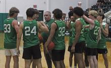 Head Coach Brent Lucas gets the Buckaroos ready for their summer league game against Newcastle as they huddle before the game Tuesday, June 10. Photo/Alex Kielar