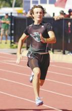 Glen Thibodeaux races in the 100-meter dash at the Area track meet Thursday, April 10, in Graham. The junior runner placed third in the race to qualify for the Regional meet Friday, April 18 and Saturday, April 19 at Abilene Christian University. Photo/Alex Havardansky