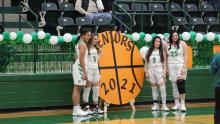 Four seniors honored