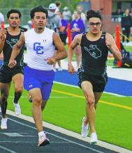 Chance Stewart leads the pack in the opening lap of the 1600-meter run final of the Colonel Mobley Relays in Stephenville, in which he finished in under five minutes to earn first place Thursday, March 27. Photo/Alex Kielar