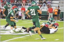 The Buckaroos’ defense dives for a loose ball in the Mavericks’ backfield. The Mavericks were held without touchdowns in the first and fourth quarters of the Buckaroos’ 41-35 homecoming win Friday, Sept. 15. Photo/Mike Williams
