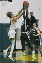 Christian Flores fights for the ball against a Cisco defender during the Bucks’ game Thursday, Dec. 5 against in the Lions Club Buckaroo Shootout. Photo/TC Gordon