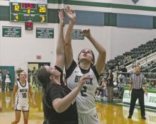 Senior Allie Valdez puts up a shot after coming down with the rebound in the closing seconds of the first half in the Lady Bucks’ Senior Night game Friday, Jan. 31. Photo/Alex Kielar