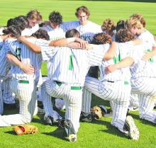 The Bucks huddle together before their Senior Night game Monday, April 21 against Tolar. That was the last game they played and have nine days off before playing a bi-district matchup at Iowa Park tomorrow. Photo/Alex Kielar
