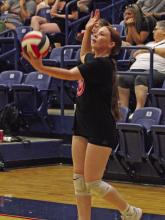A Lady Bucks player gets ready to serve during a Graham summer volleyball game Monday, June 23, during the league’s final week. Photo/Alex Havardansky